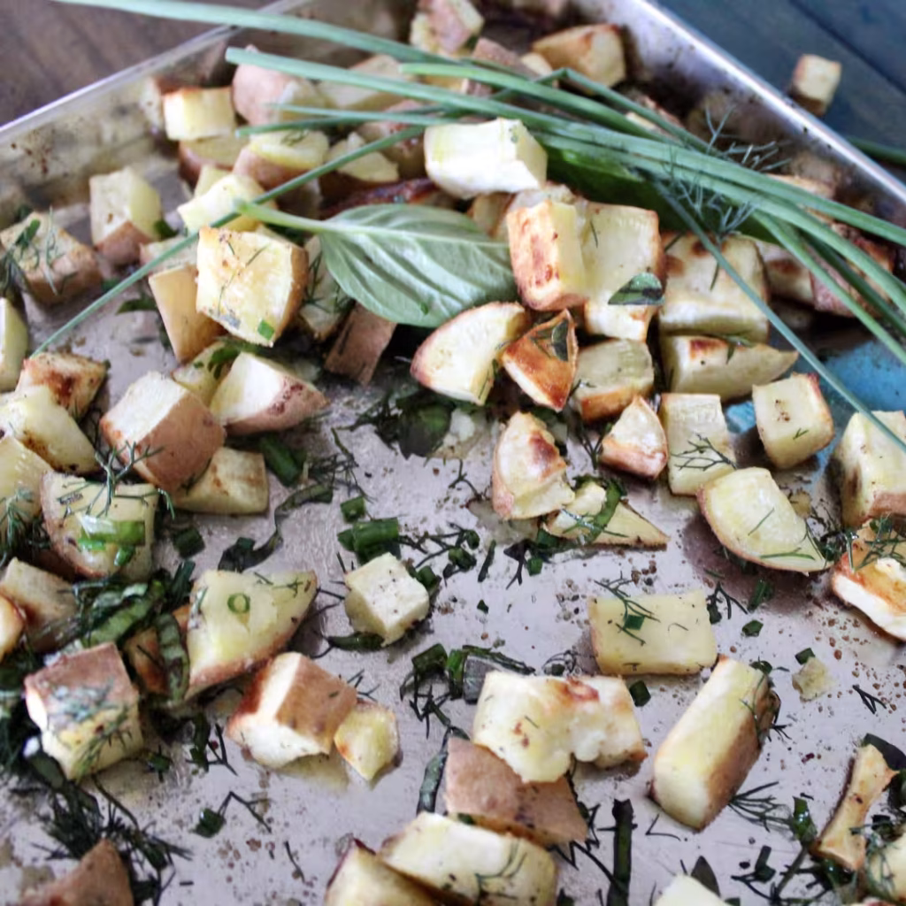 Tray of potatoes and herbs